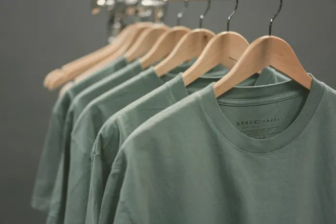 photo of blue crew-neck tops